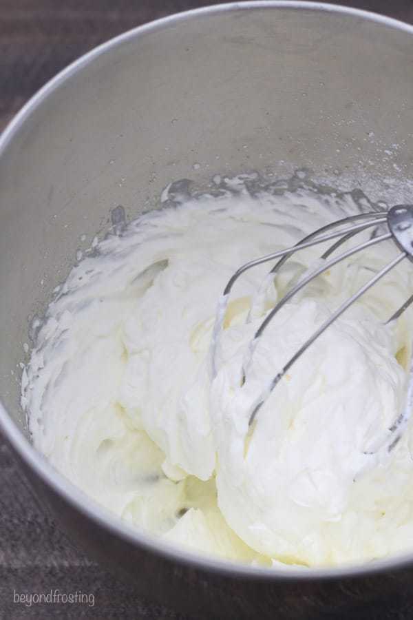 A look inside of a mixing bowl showing what stiff peaks look like