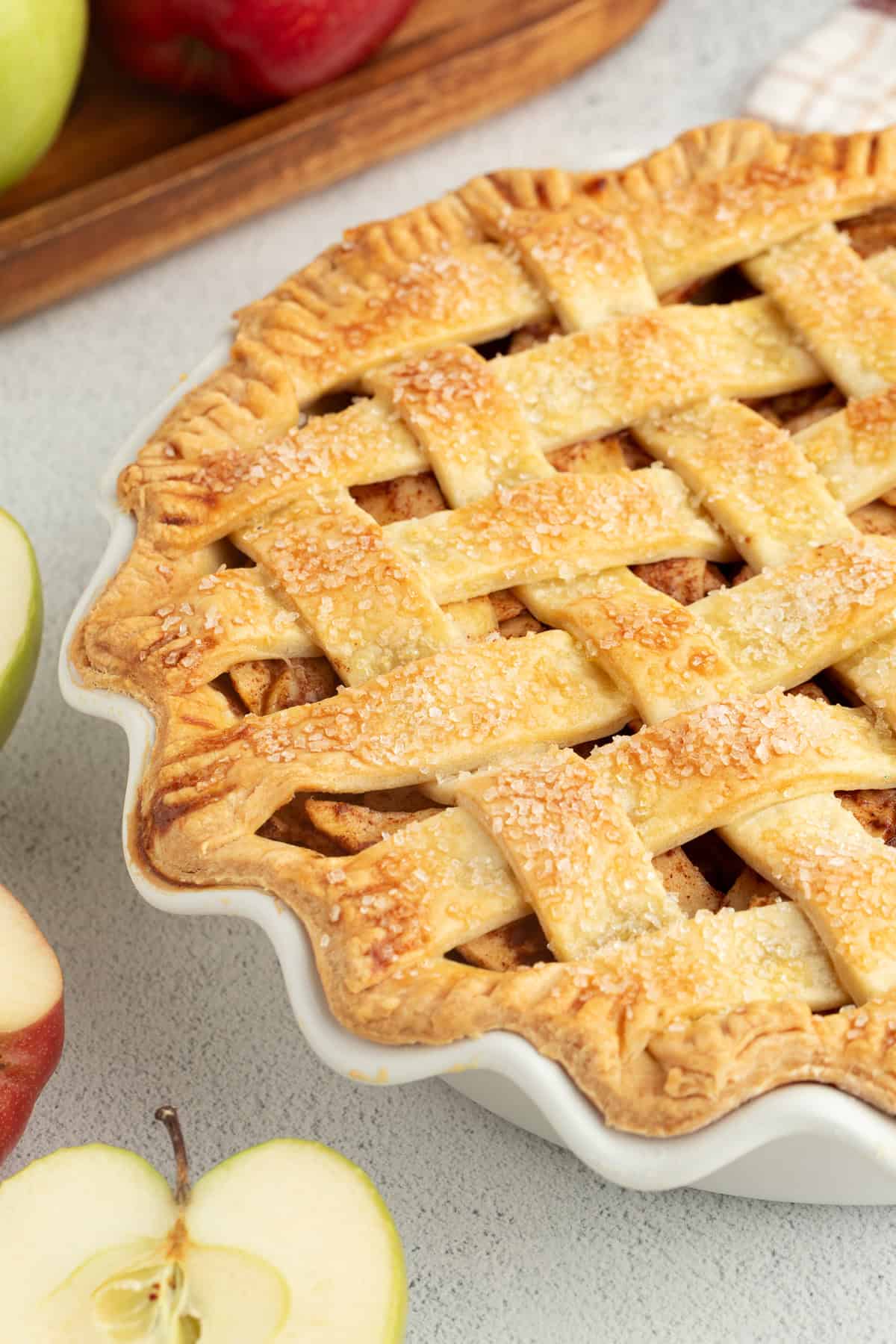 Classic apple pie with a lattice crust in a fluted pie plate.