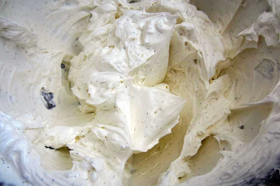 A bowl of Swiss meringue buttercream will vanilla bean extract