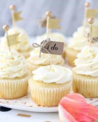 These engagement themed cupcakes are super cute decorated with a buttercream rose and a little cupcake topper that says "I do"