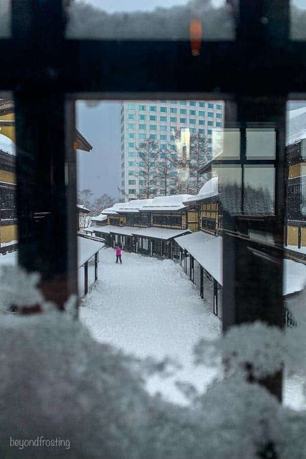 View out the window into Niseko Village restaurant and shops