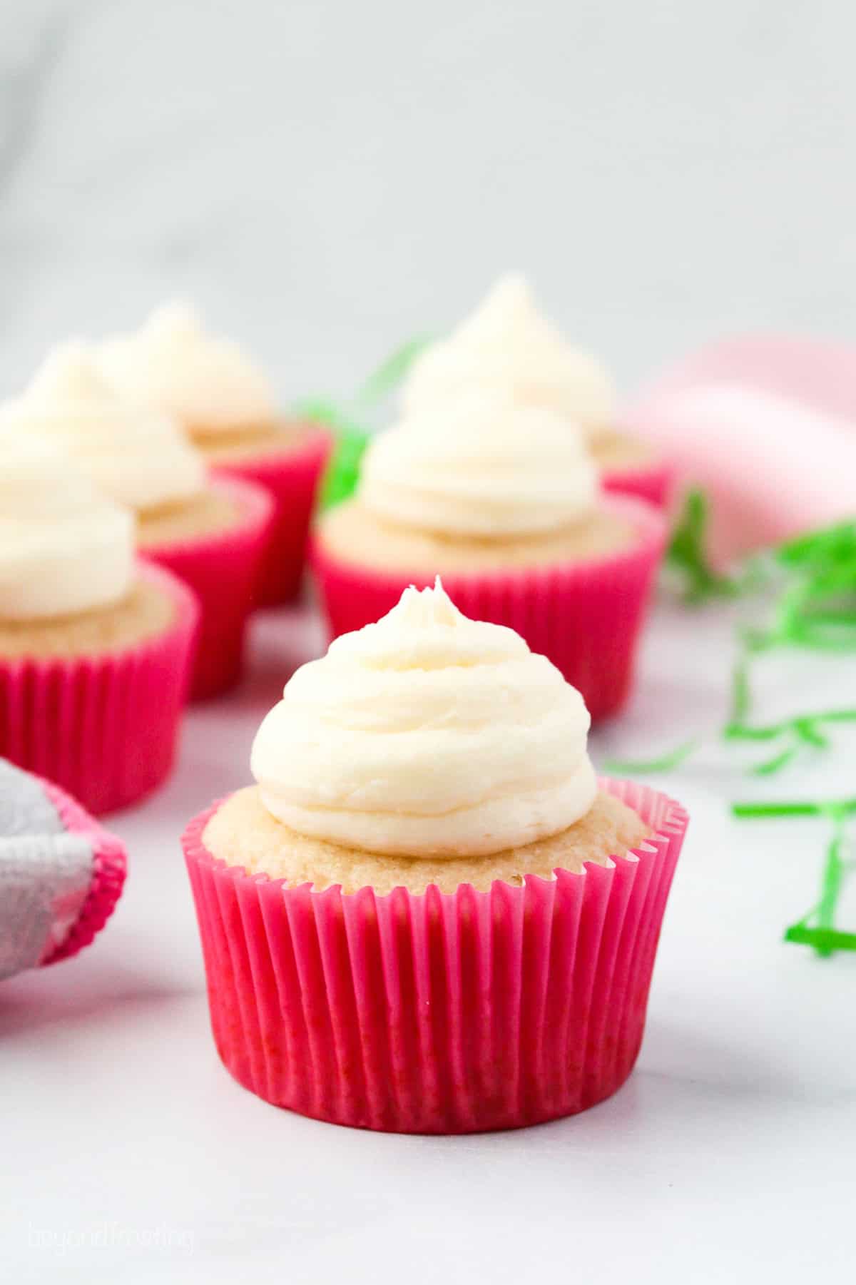 Make adorable Easter bunny cupcakes with chocolate ears following this easy step-by-step tutorial. They’re the perfect Easter cupcakes! Cupcakes topped with piped frosting.