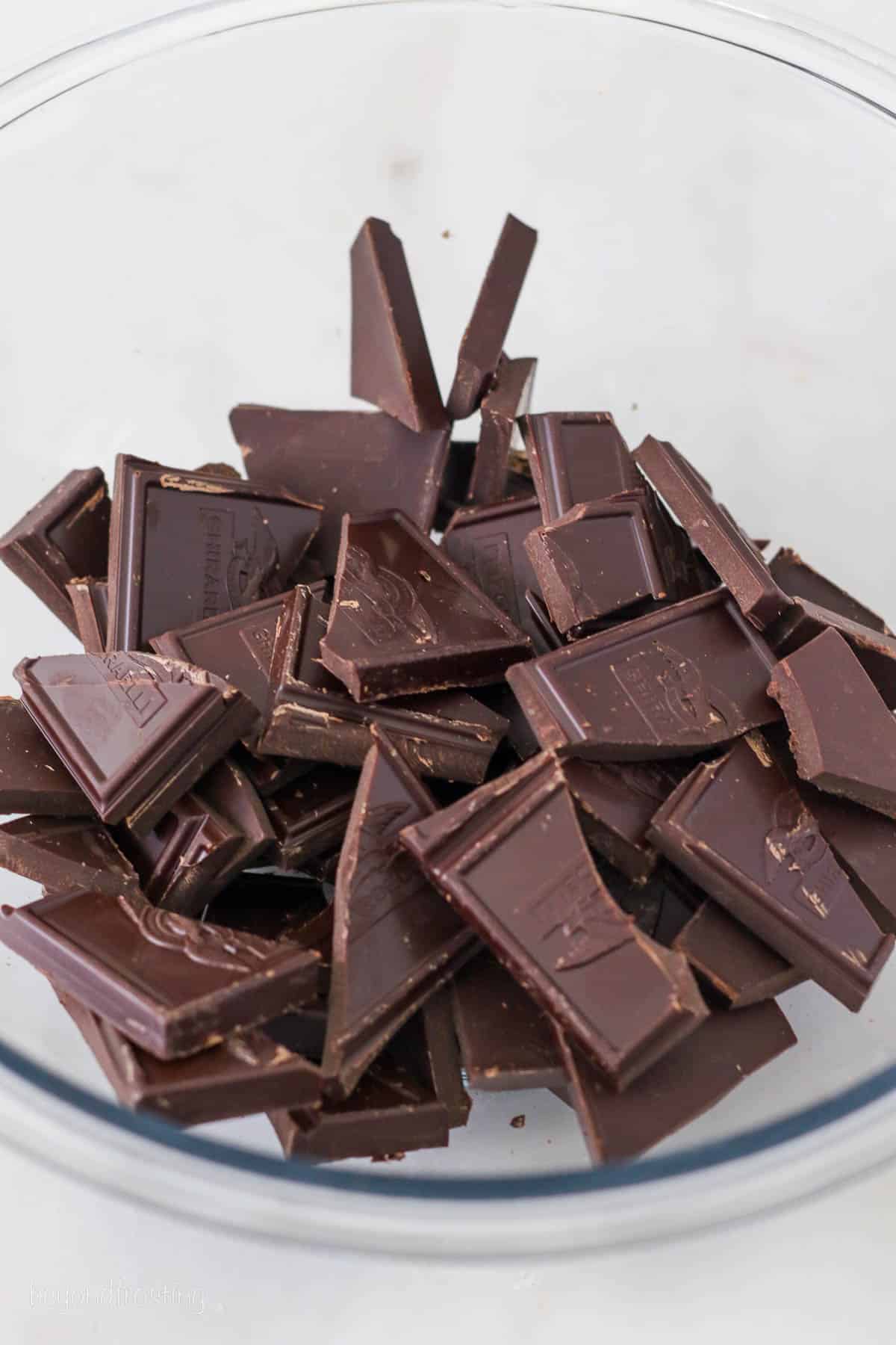 Chopped chocolate in a microwave safe bowl.
