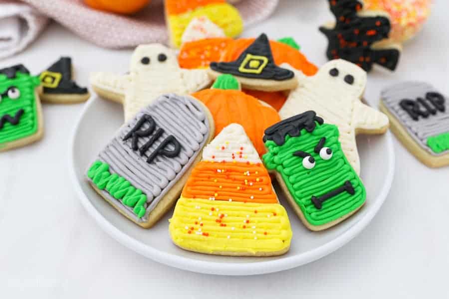 A plate of decorated halloween sugar cookies.