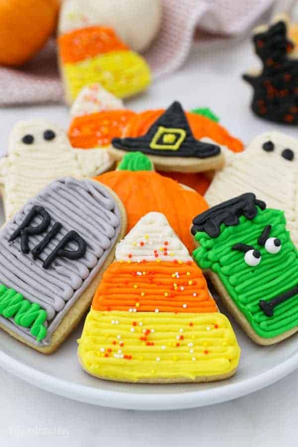 Plate of frosted Halloween sugar cookies.