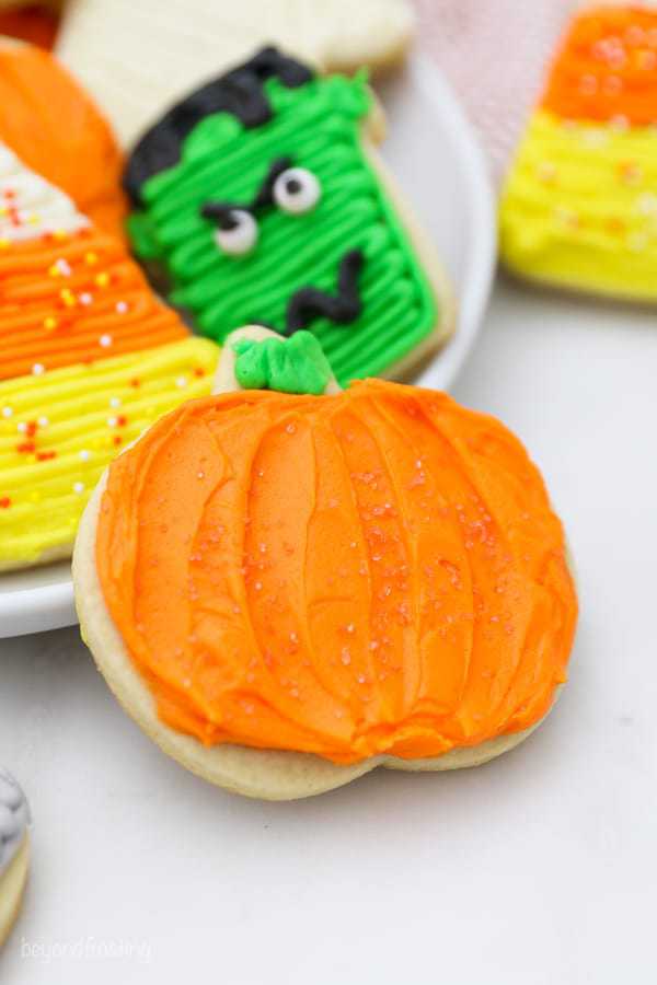Frosted Pumpkin shaped sugar cookie.
