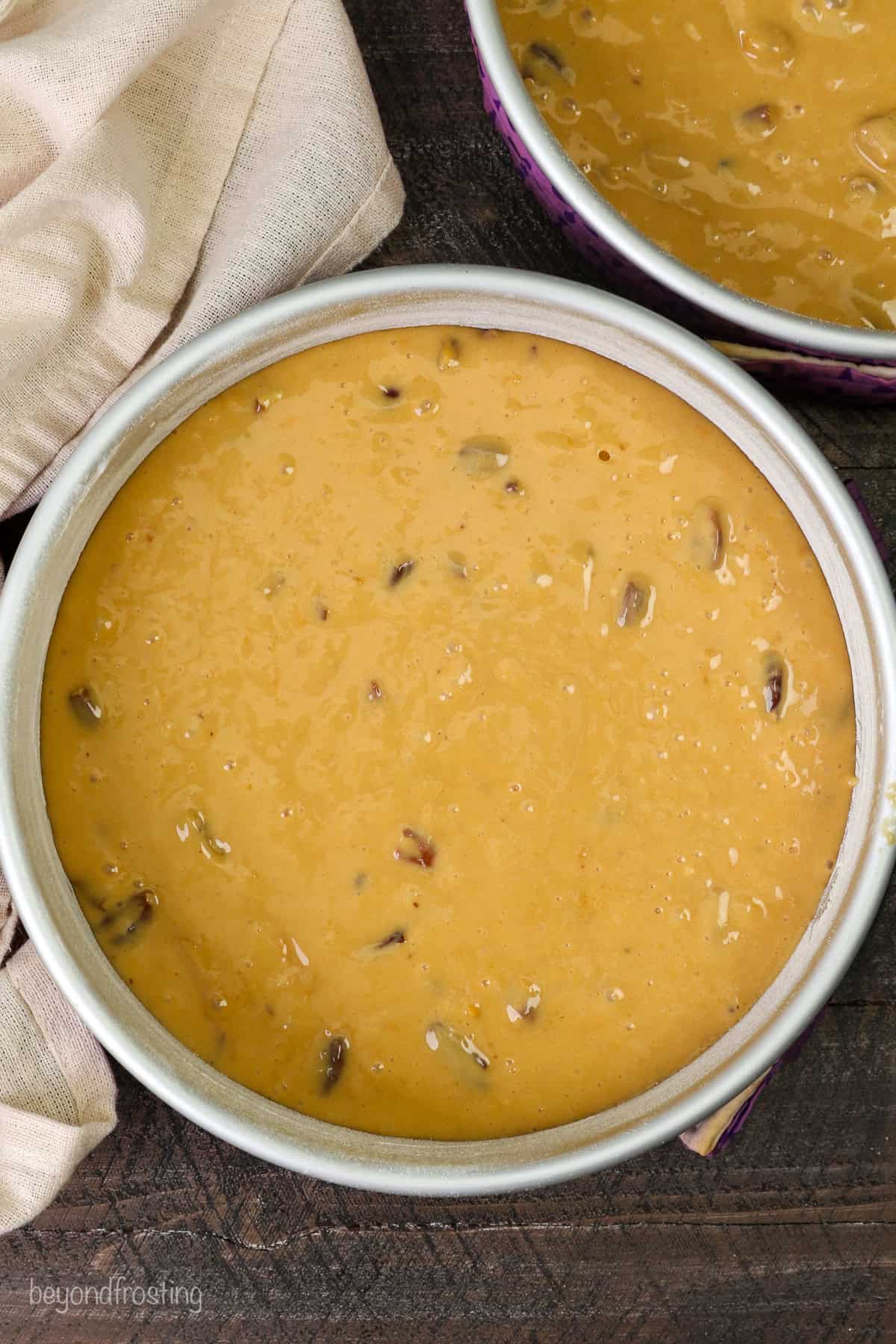 Butterscotch cake batter in a round pan.