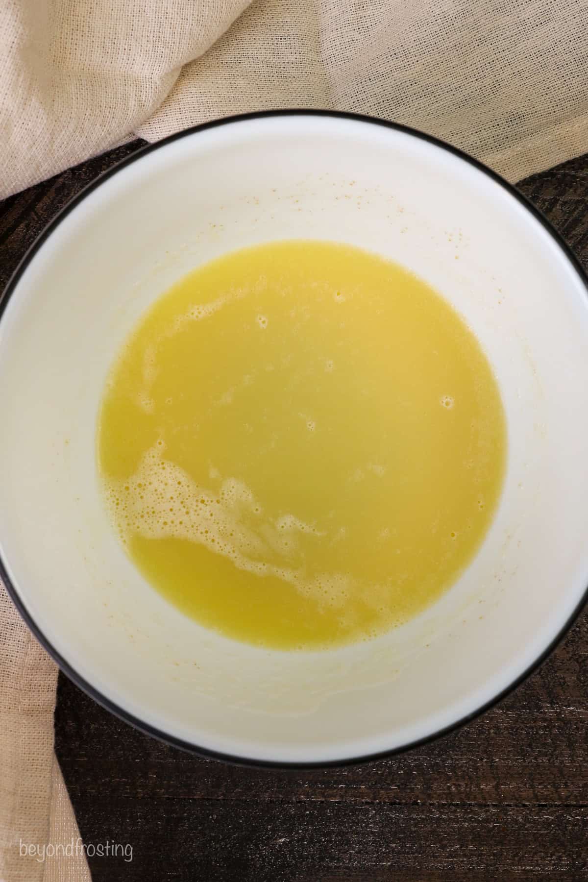 Melted butter in a bowl.