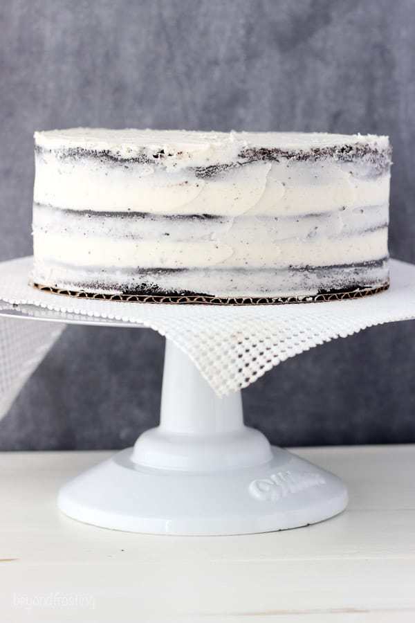 a layer cake frosted with a crumb coat