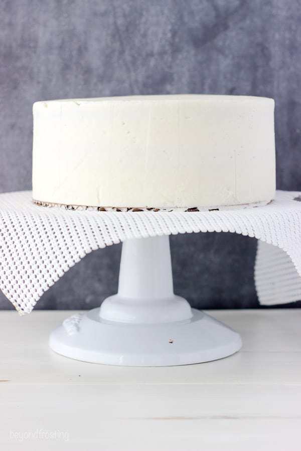 A frosted layer cake with sharp edges