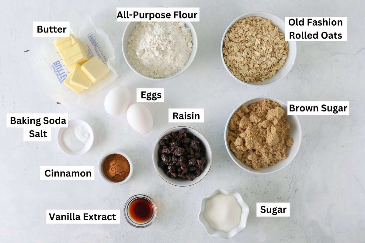 Oatmeal raisin cookies ingredients with text labels overlaying each ingredient.