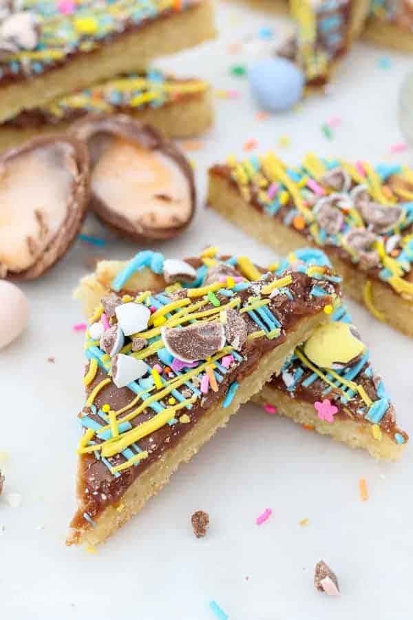A colorful, decorated sugar cookie bar with Cadbury Mini Eggs