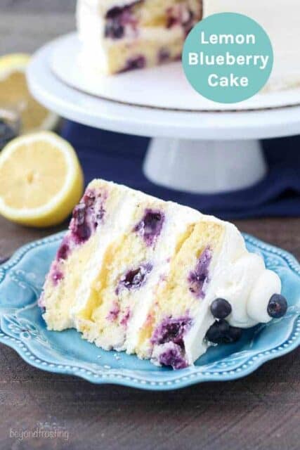 A slice of lemon blueberry cake on a teal plate with text overlay
