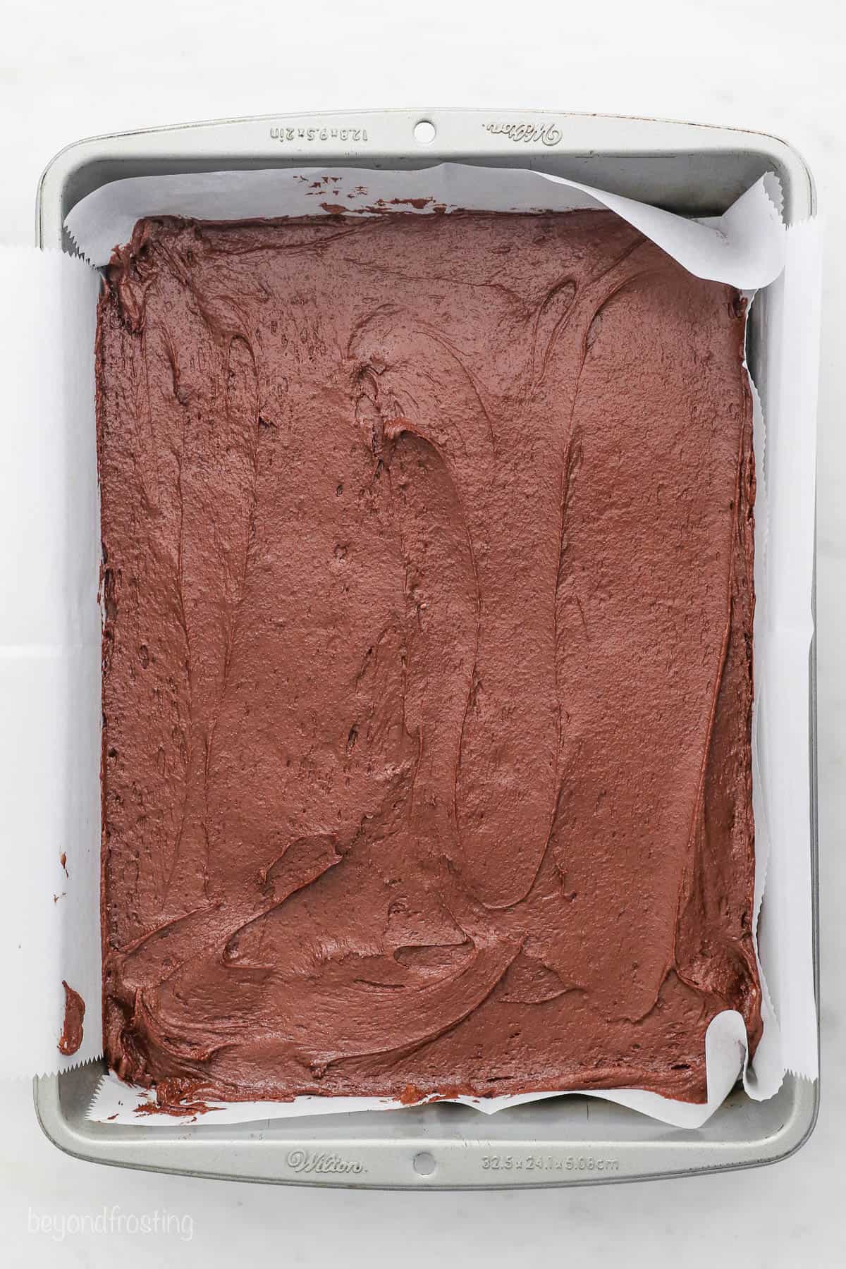 A baking pan filled with brownie batter