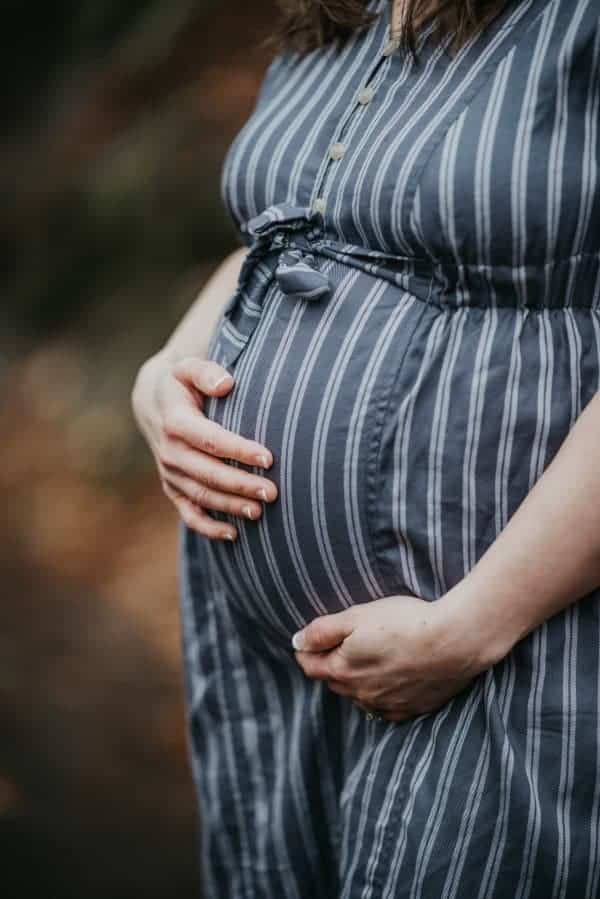 maternity shoot with belly photo