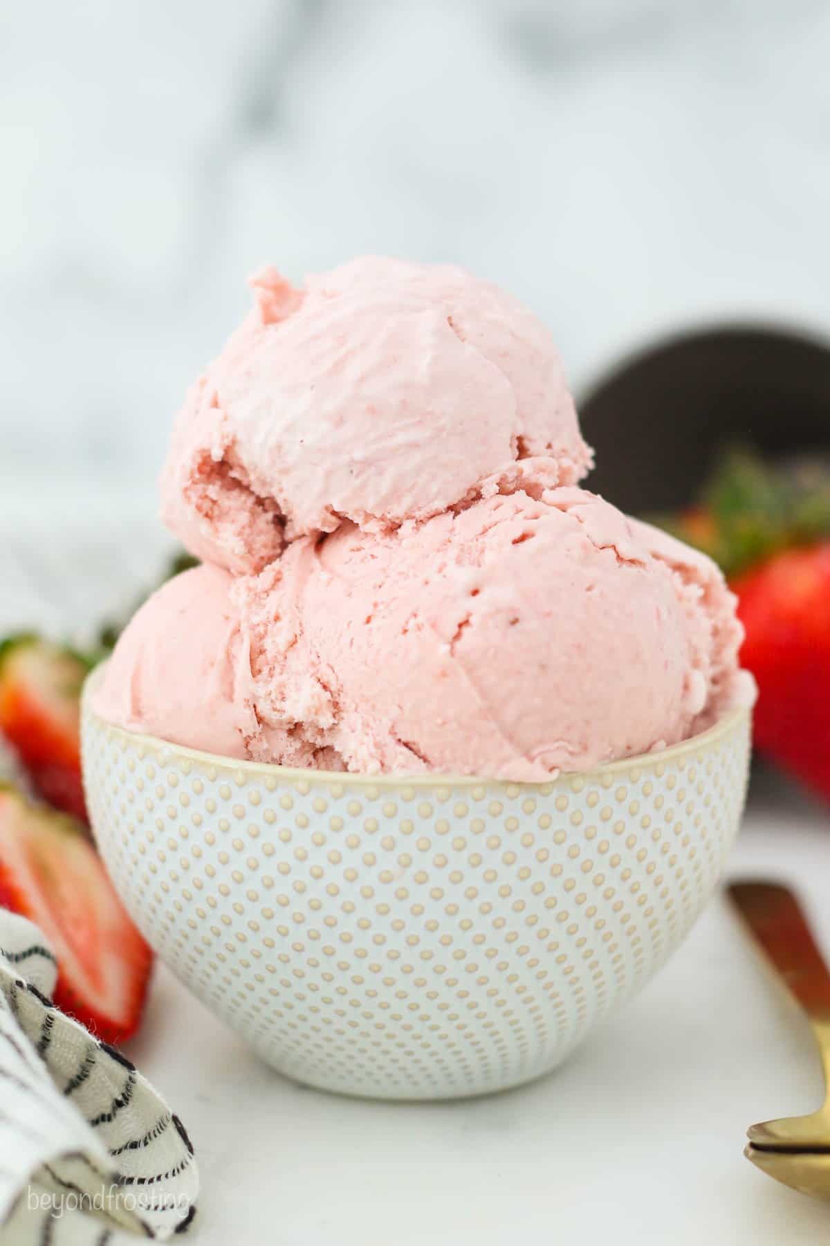 A heaping bowl of strawberry ice cream