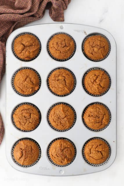 Finished pumpkin muffins in the muffin tin.