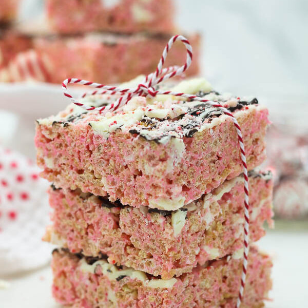 three rice krispie treats stacked and tied with a ribbon