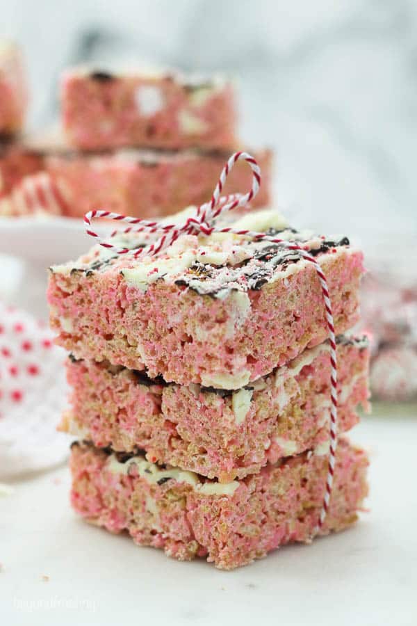 three rice krispie treats stacked and tied with a ribbon
