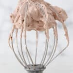 A whisk attachment for a stand mixer with chocolate whipped cream