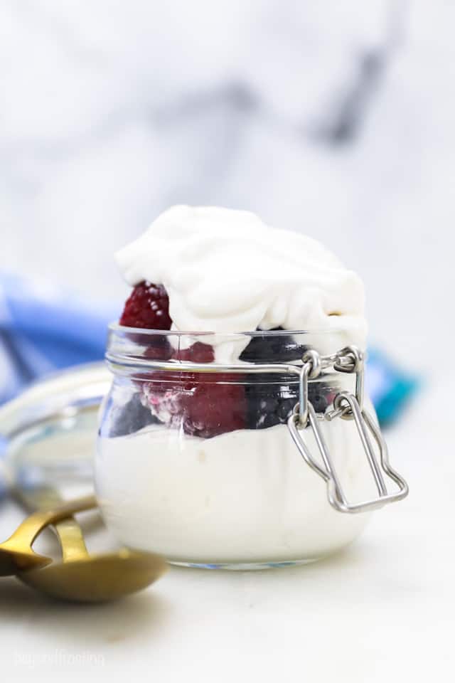Dairy-Free Whipped Cream in a Glass Jar with Fresh Berries