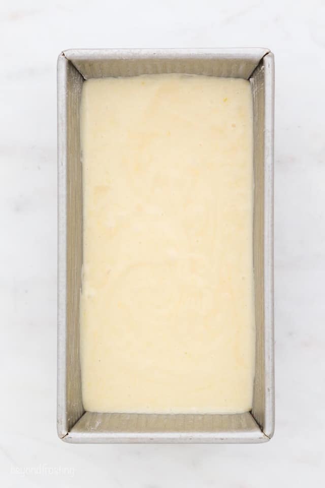 overhead shot of a loaf pan filled with batter