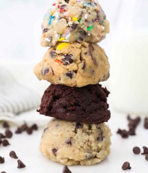 A Stack of Edible Cookie Dough in Each Flavor with Mini Chocolate Chips on the Table