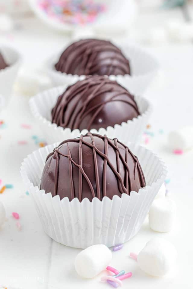 Hot chocolate bombs sitting in a cupcake wrapper