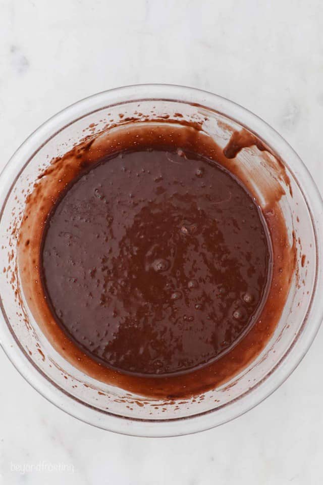 Chocolate Cake Batter in a Large Glass Mixing Bowl