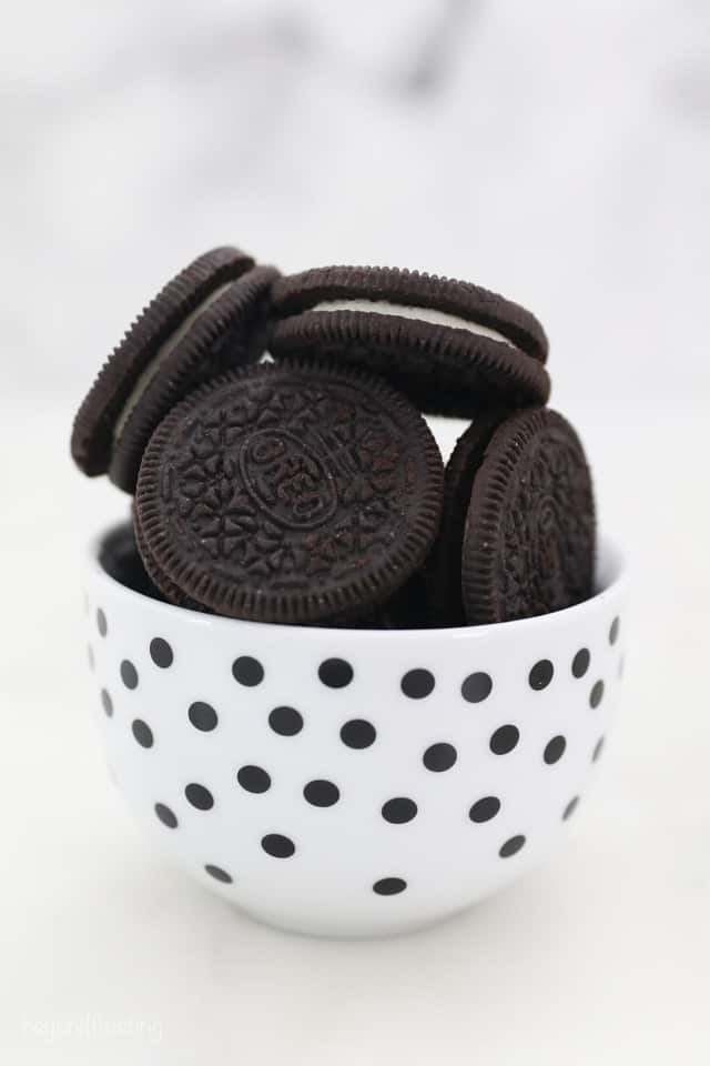 Oreo Sandwich Cookies in a White Bowl with Black Polka Dots
