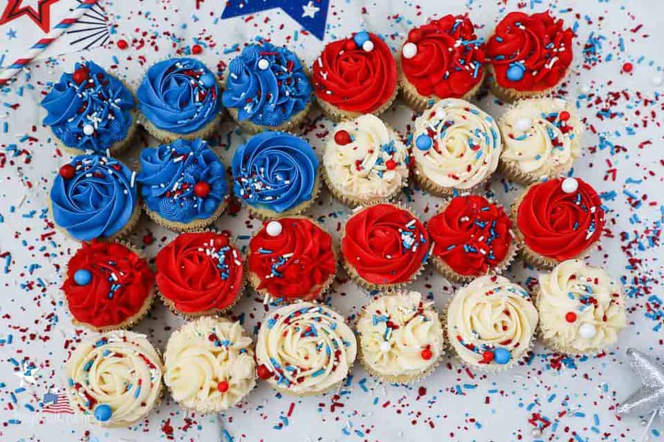 Birds eye view of decorated cupcakes laid out in the shape of a flag