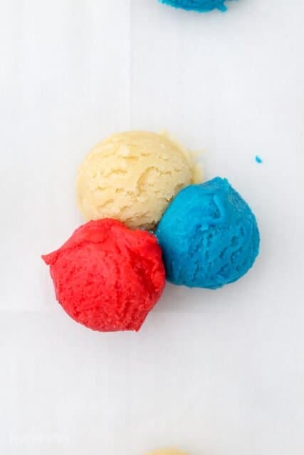 three scoops of sugar cookie dough in red white and blue color