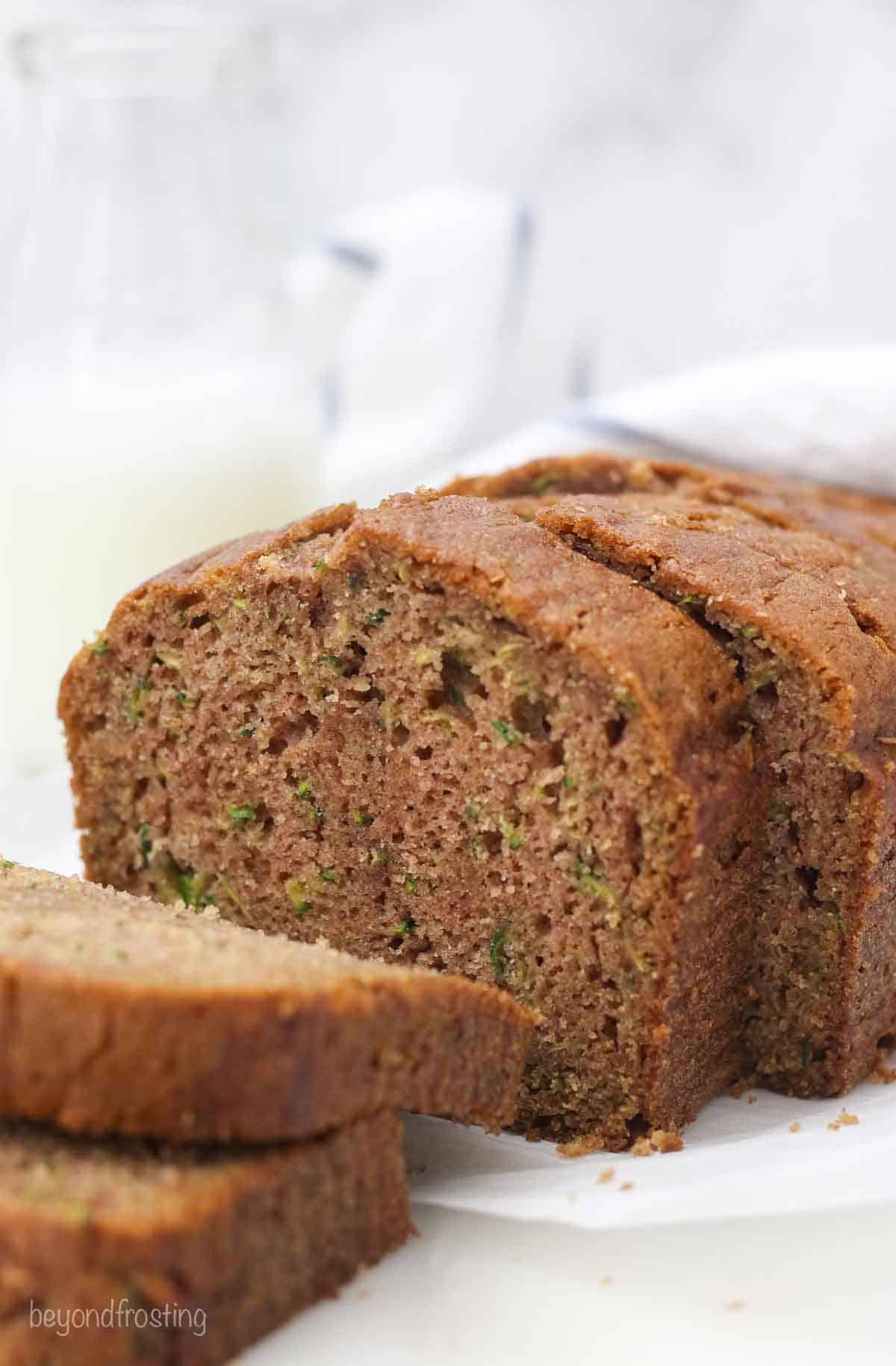 slices of zucchini bread on white parchment paper