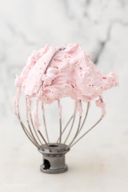 a whisk attachment with strawberry whipped cream