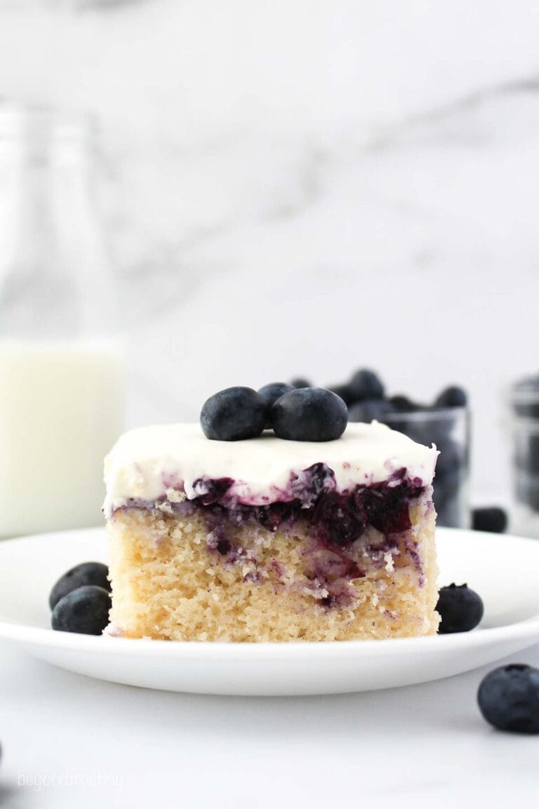 Blueberry Cheesecake Poke Cake | Beyond Frosting