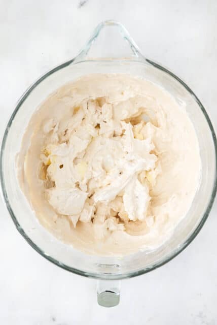 maple buttercream frosting in mixing bowl