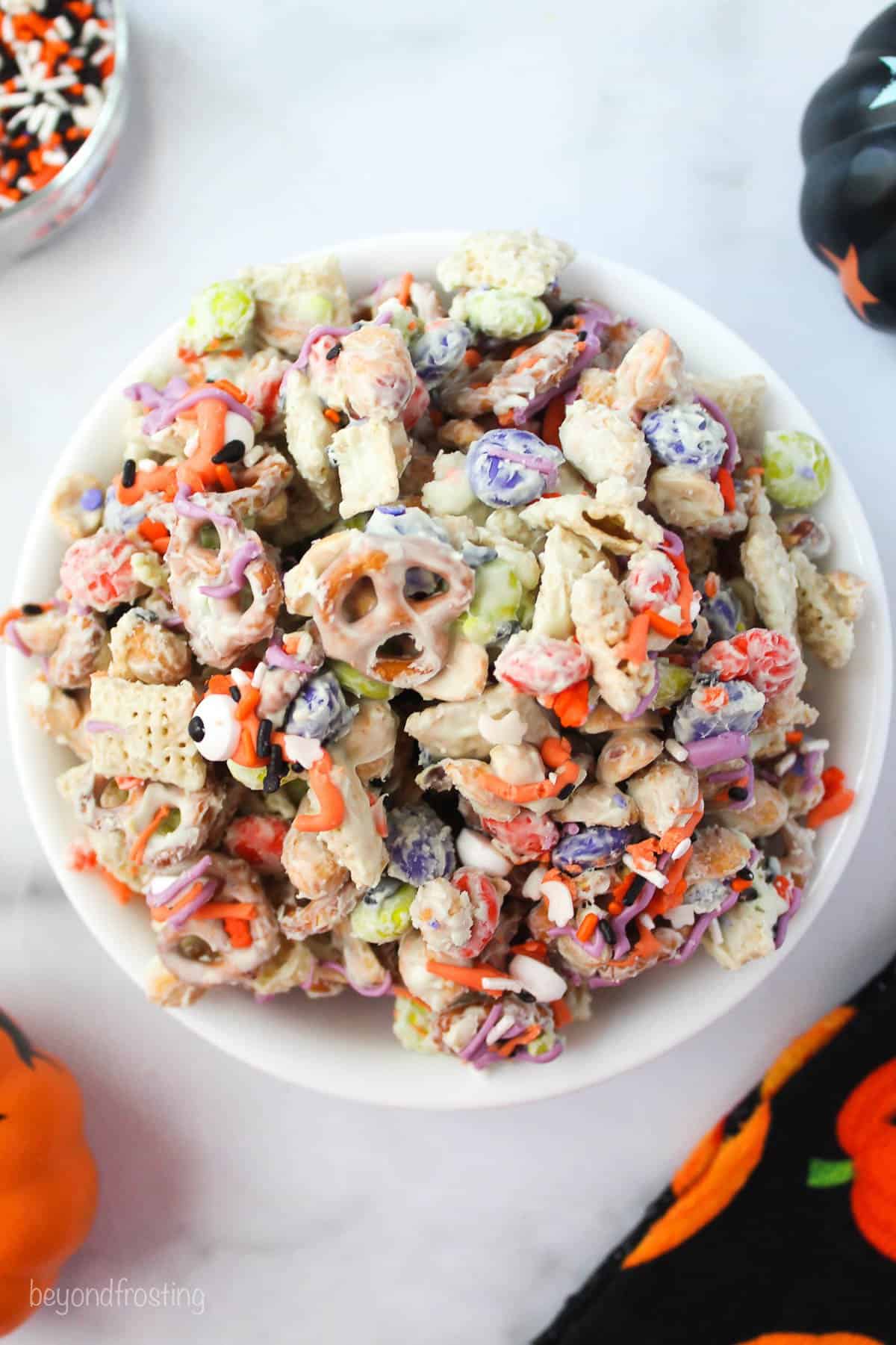 Overhead view of a bowl filled with Halloween monster munch.