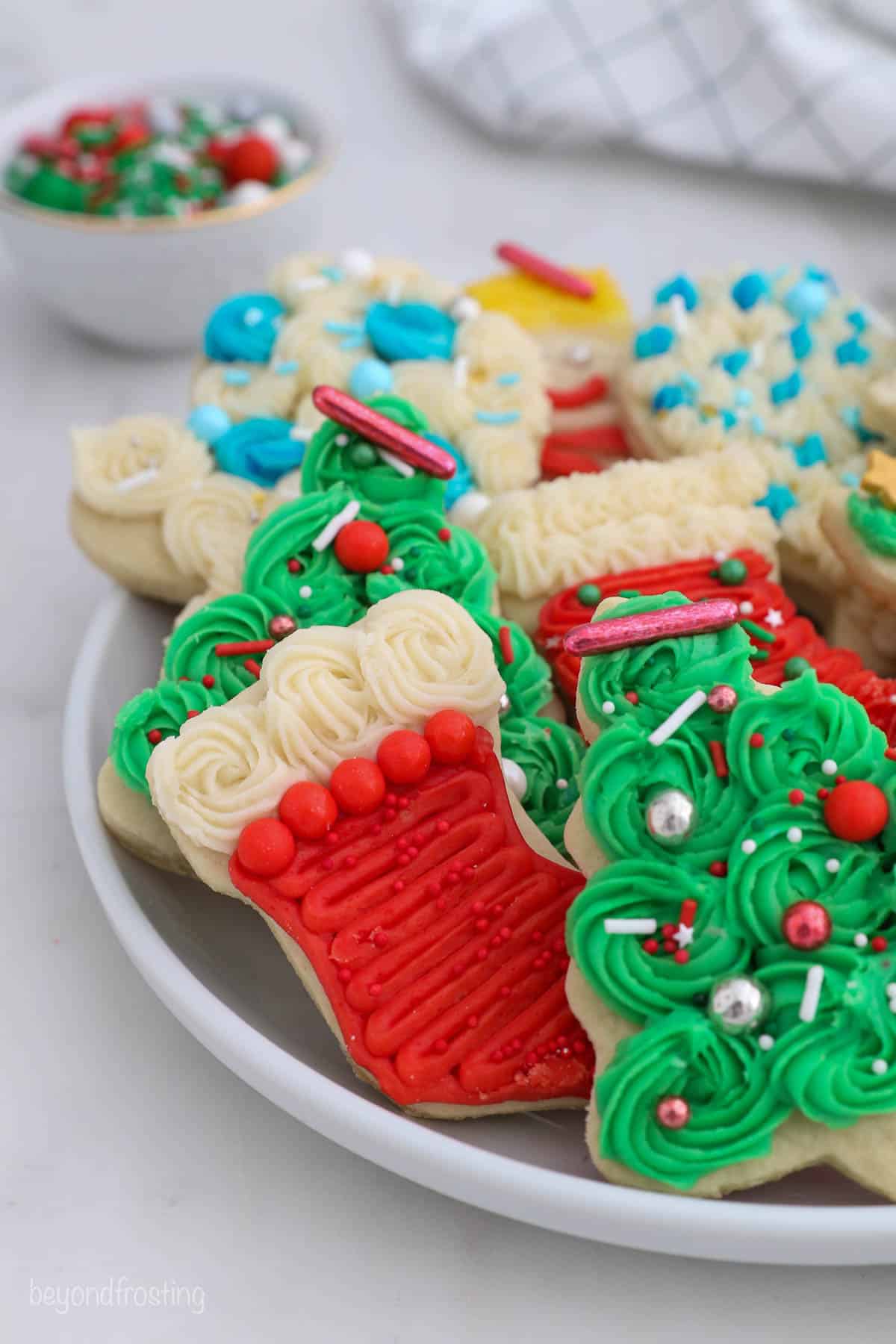 Decorated Christmas cookies with buttercream and sprinkles