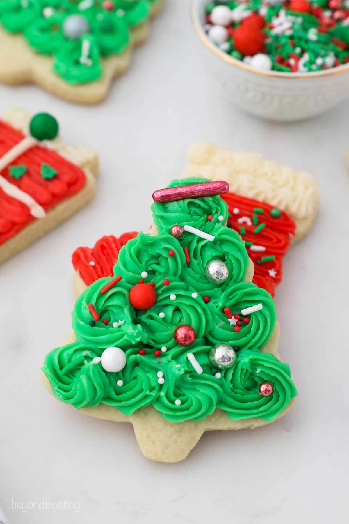 Frosted Christmas Tree sugar cookie with sprinkles