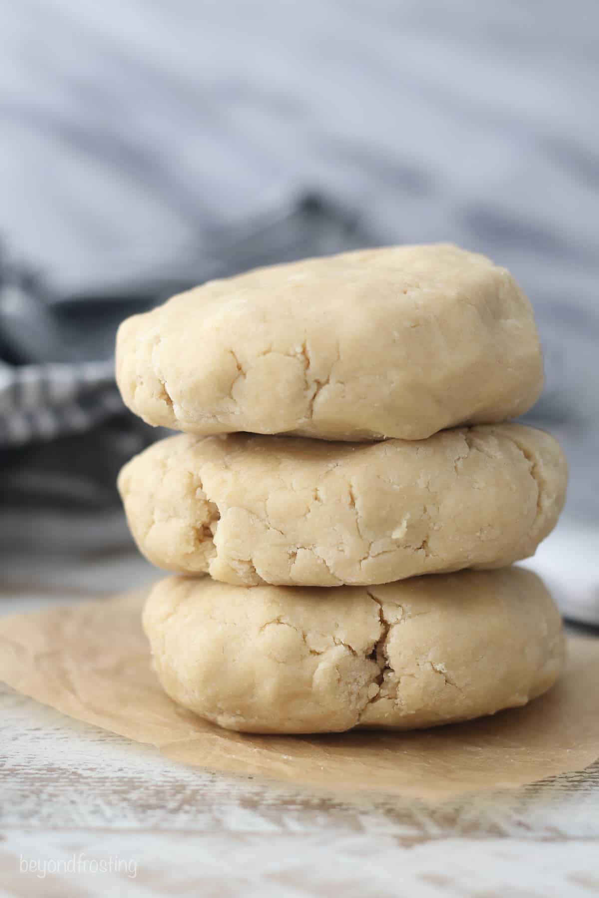 3 stacked balls of sugar cookie dough