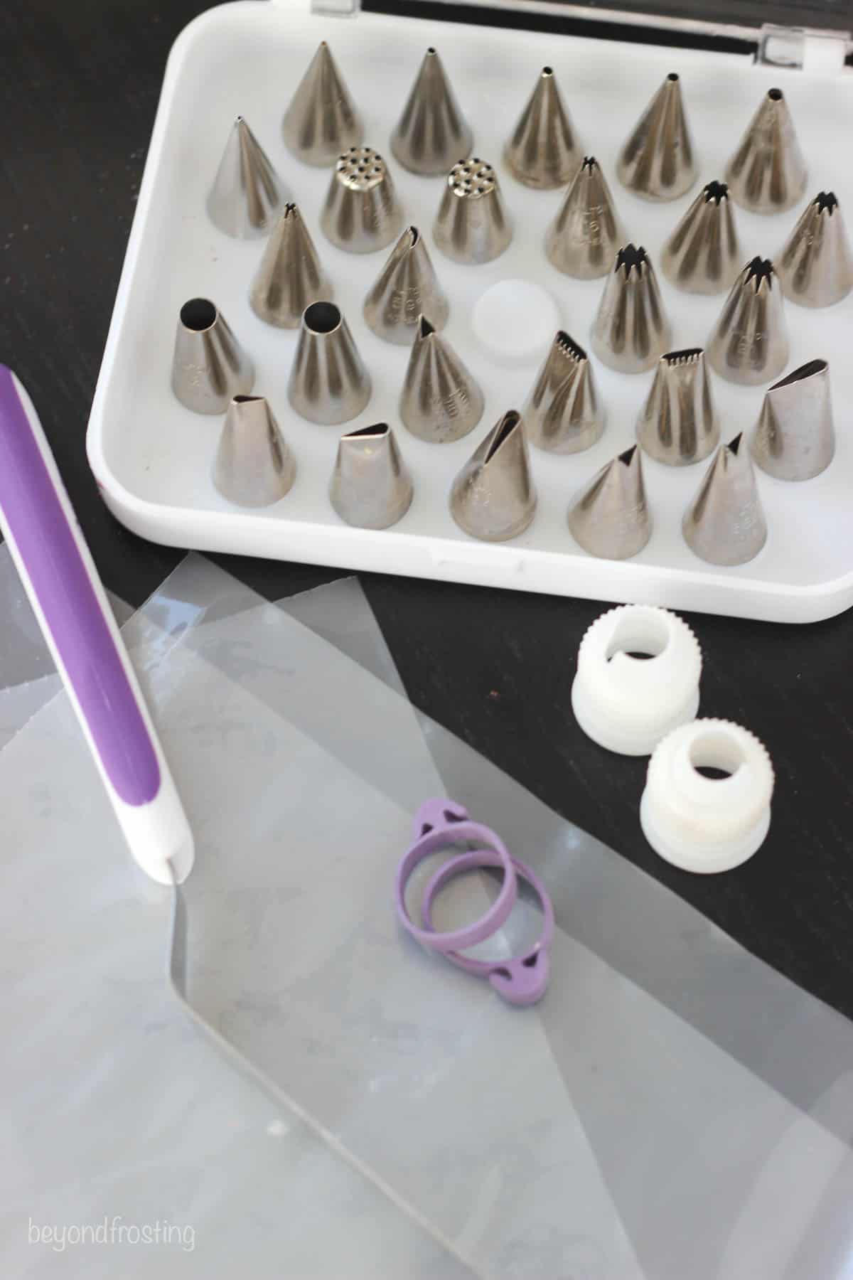 a piping bag, angled spatula, couplers and piping tips