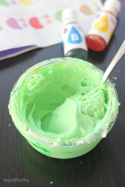 a bowl of green frosting