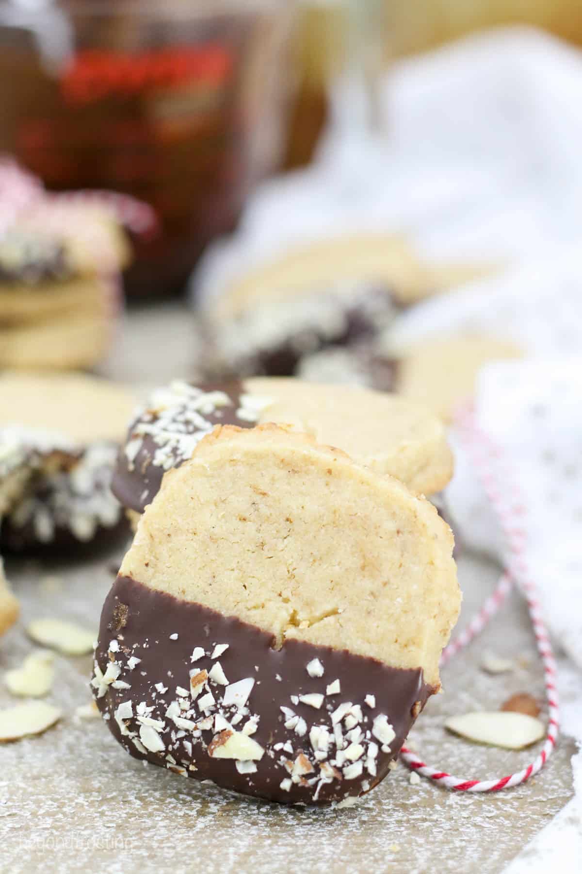 shortbread cookie leaning on a stack of more cookies