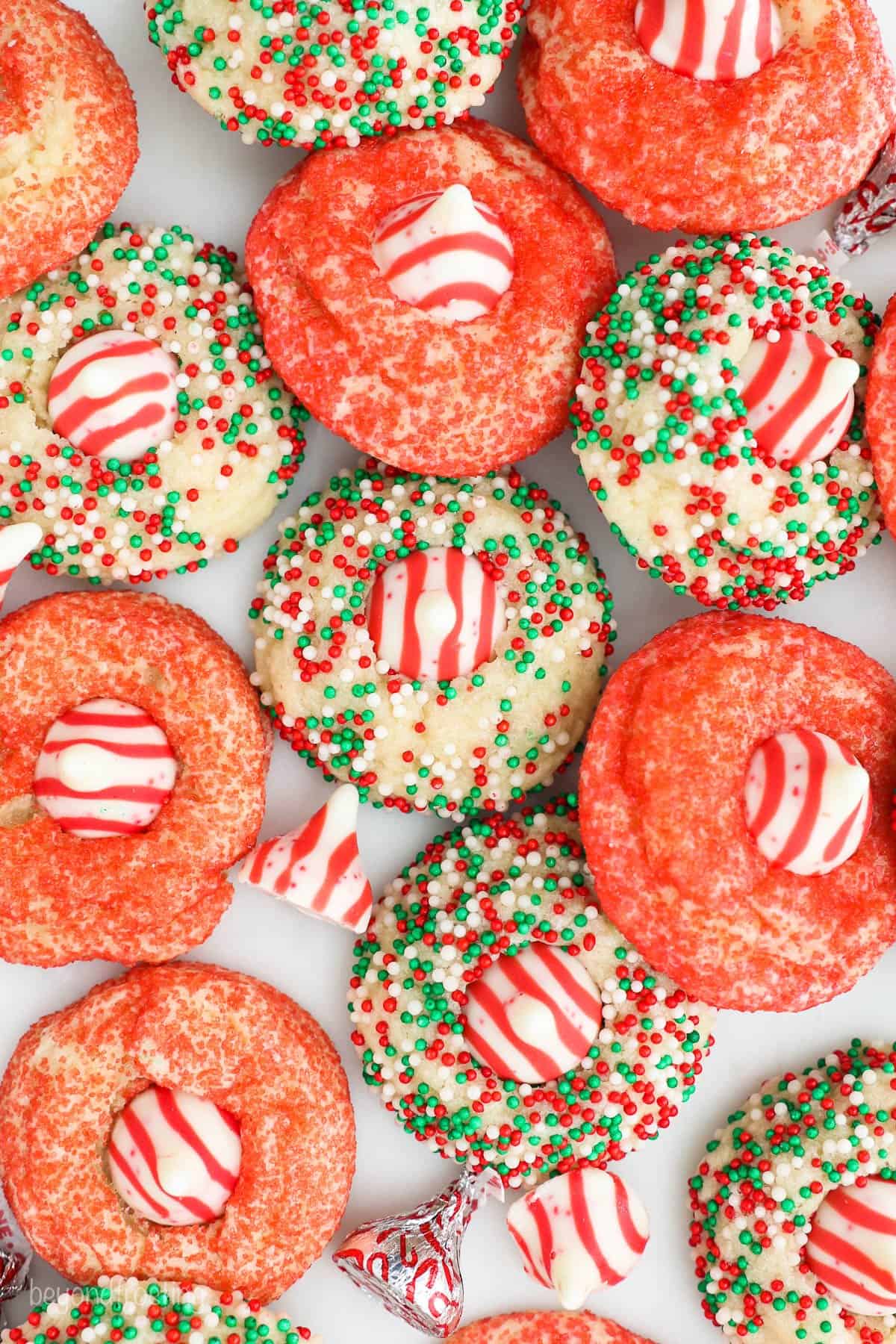 overhead shot of peppermint cookies topped with Hershey's Candy Cane Kisses