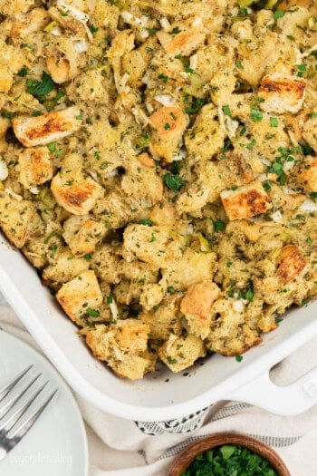 A white baking dish with handles full of homemade dressing