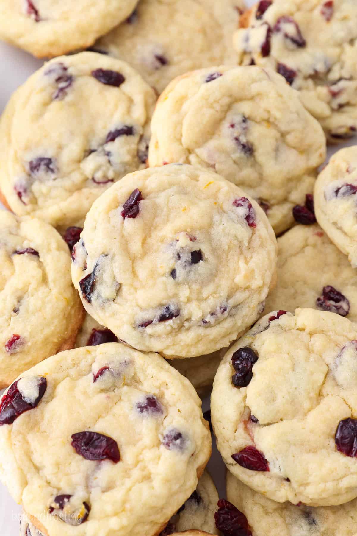 top down view of stacked cranberry orange cookies