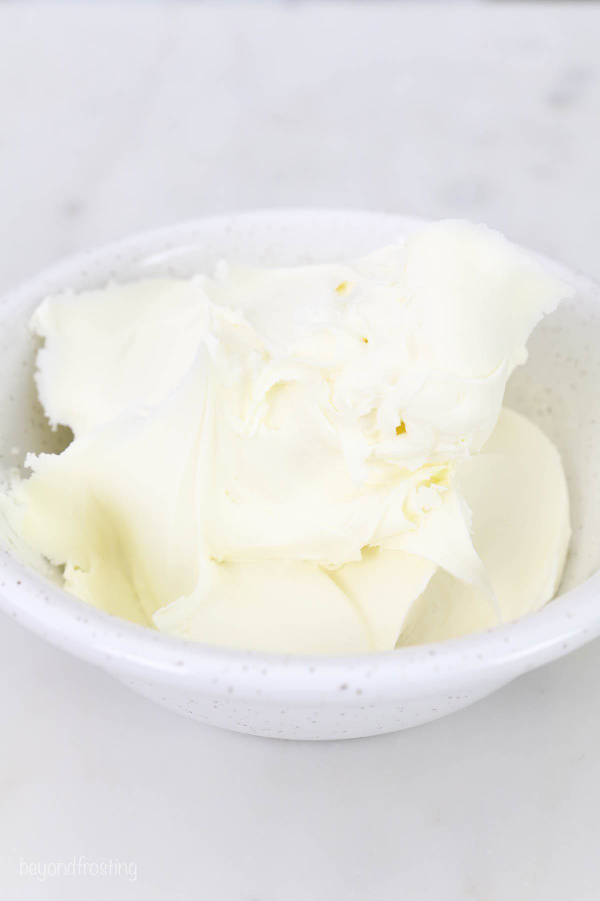 a white bowl with mascarpone cheese