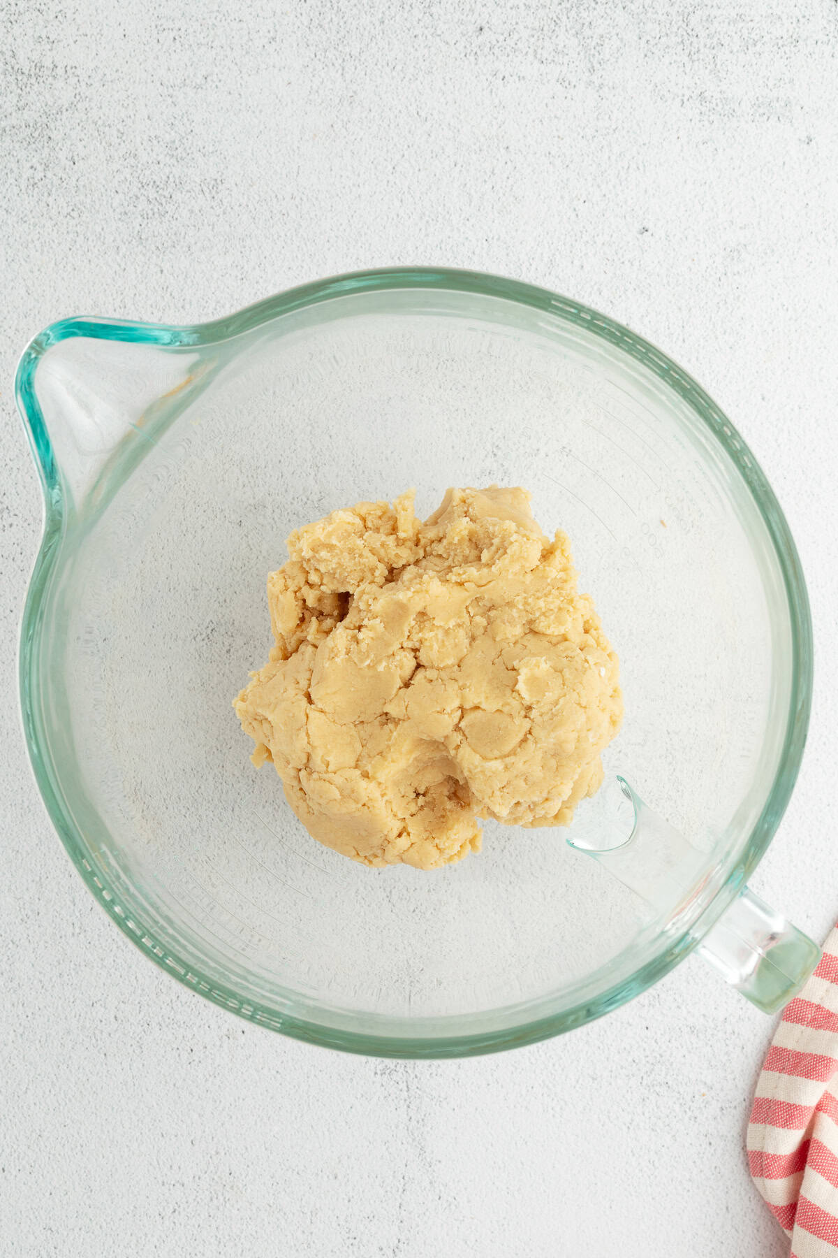 Thumbprint cookies are buttery, melt-in-your-mouth shortbread cookies rolled in sugar, filled with fruit jam, chocolate, caramel, and more.