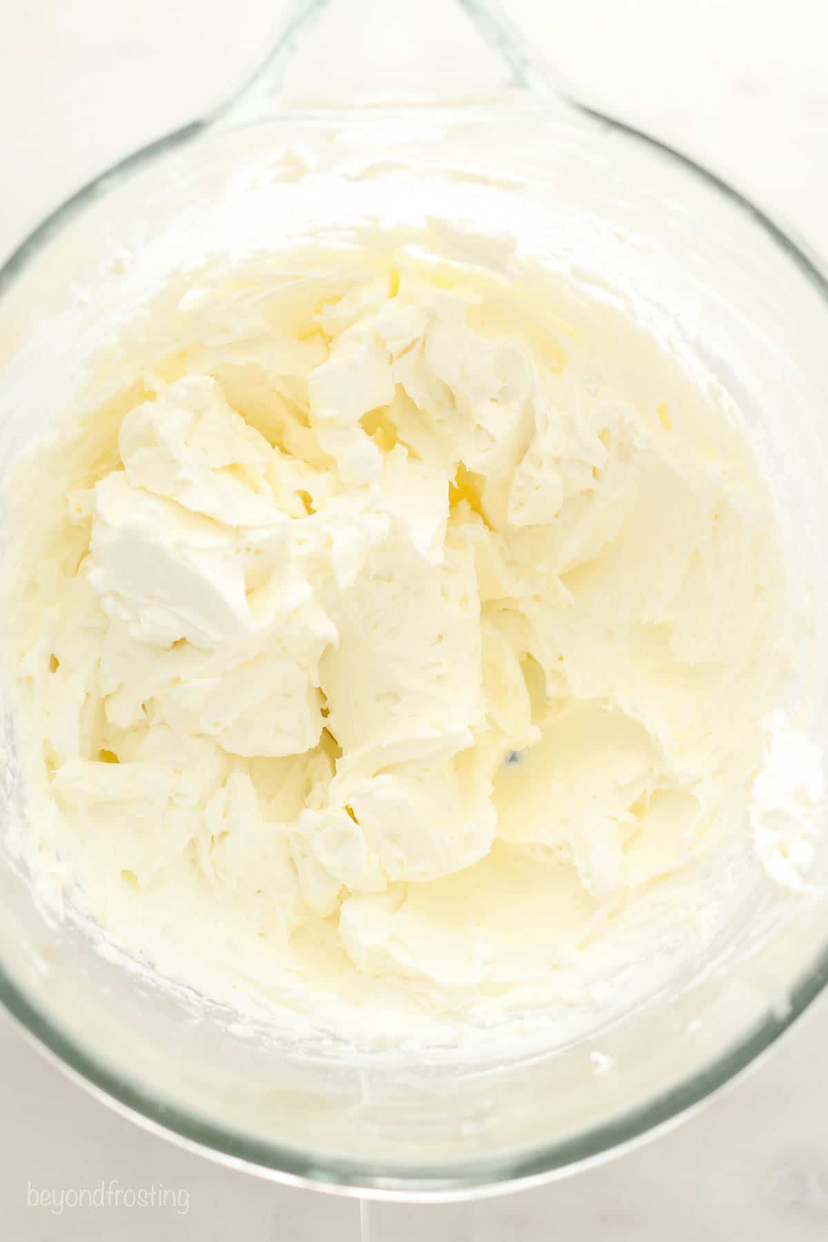 Mascarpone whipped cream in a large mixing bowl