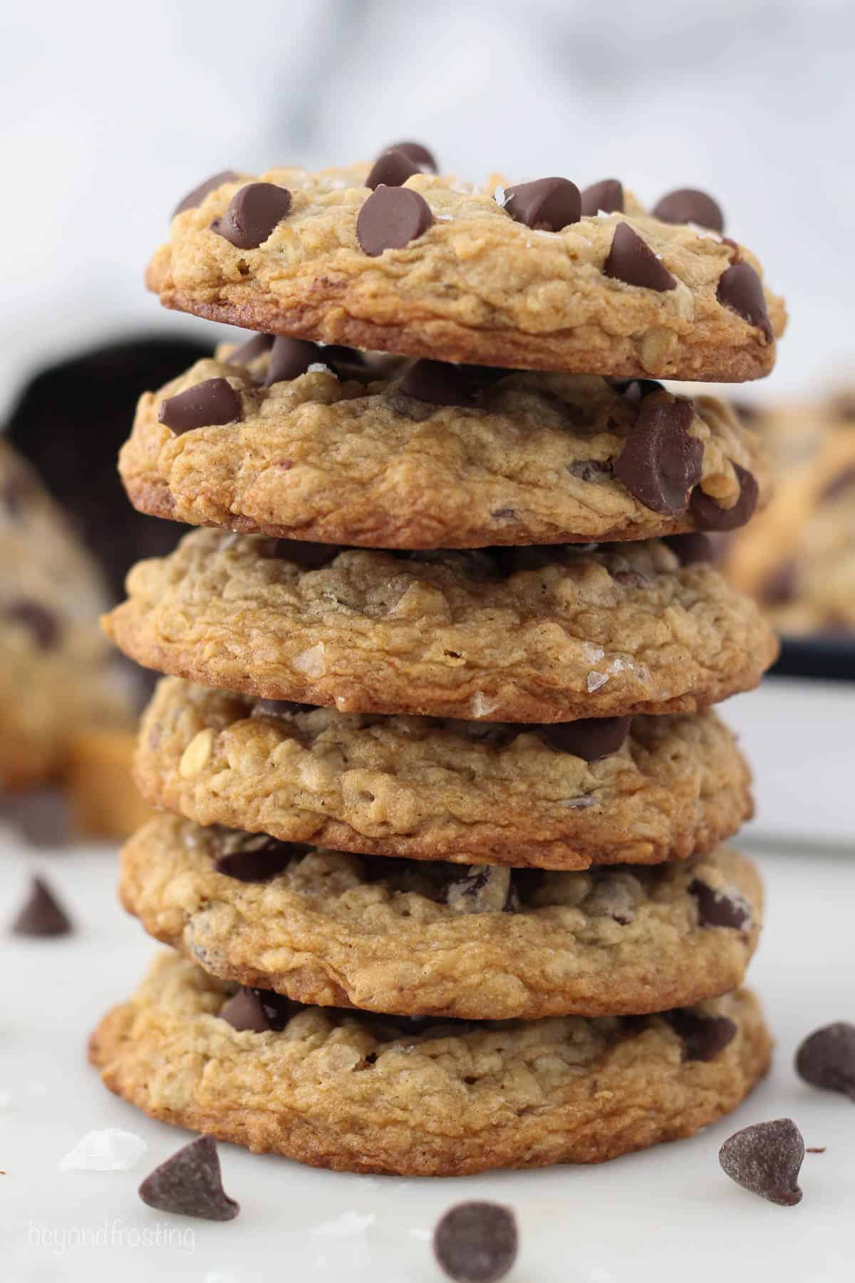 side view of six salted caramel oatmeal cookies stacked